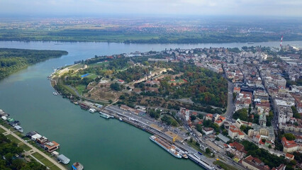 Daytime aerial shot in Belgrade, Serbia. Sava River and general city view