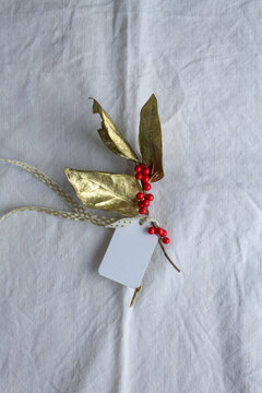 Traditional yet modern christmas decoration on linen, white, gold and red mood