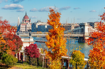 Budapest autumn cityscape with Hungarian parliament building and Chain bridge over Danube river,...