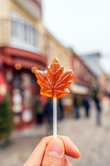 Maple syrup candy on stick in Quebec City - 680529760