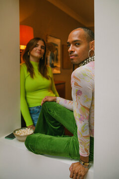 Analogue style portrait of two young multiracial adults in fashionable outfits