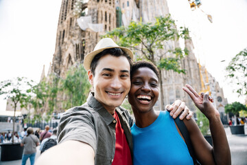 Couple visiting a famous modern Church and taking selfie