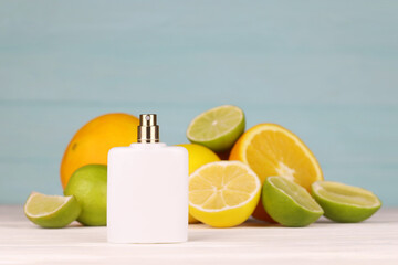 Perfume with citrus extracts. Selective focus. Spa day, concept of freshness perfume bottle with...