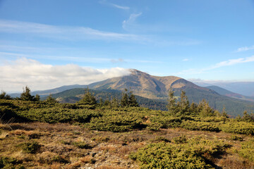 Landscape with Mount Hoverla hanging peak of the Ukrainian Carpathians against the background of the sky and clouds