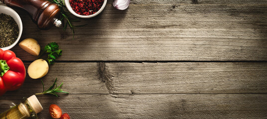 Menu background. Spices and ingredients for cooking food on a wooden table top view