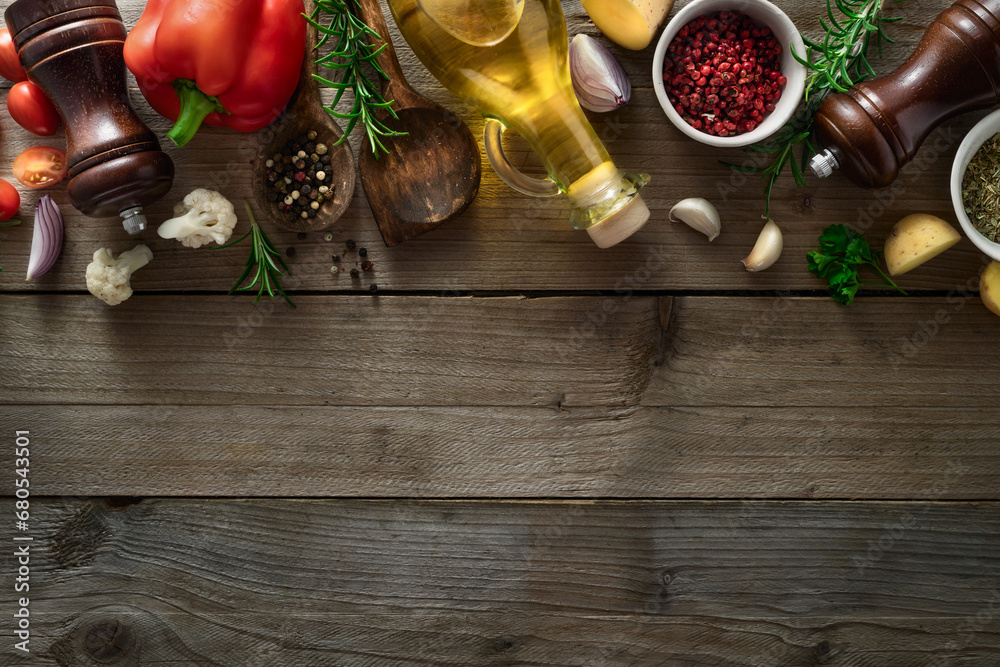 Poster menu background. spices and ingredients for cooking food on a wooden table with copy space top view