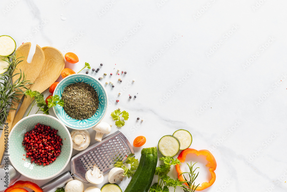 Poster cooking background food. spices and ingredients for preparation on white background with copy space 