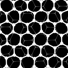 An abstract pattern with a bold black and white honeycomb motif on a black background, featuring a mesh-like design