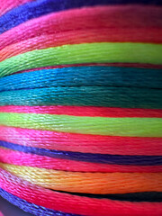eye-catching coil of rope in saturated and fluorescent colors yarn