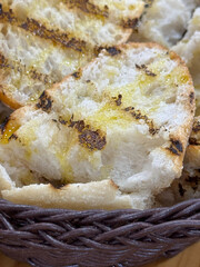 basket of slices of toasted bread with olive oil