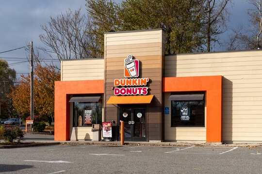 A Dunkin' Donuts  restaurant in West Springfield, MA, USA, on November 12, 2023. Dunkin' is an American multinational coffee and doughnut company. 