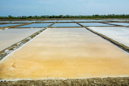 Salt Fields Filled With Water And Piles Of Salt, solt fieds pattani thailand.