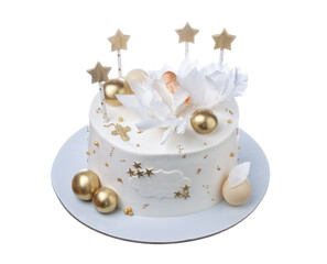 Delightful festive in gold colors christening cake for a baby girl on a white isolated background.