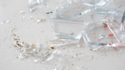 Close up of shattered glass lying on the floor - 680558377