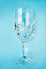 Wineglass on blue background