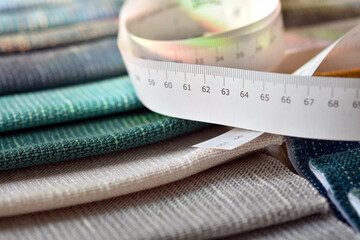 Close up view, Tape measure with sample fabric material polyester for making furniture products and...