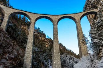 Wallpaper murals Landwasser Viaduct View of Landwasser Viaduct, Rhaetian railway, Graubunden in Switzerland at winter