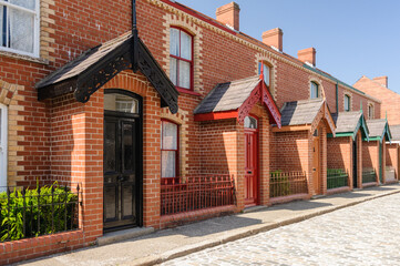 A street of townhouses, traditionally built in Victorian Belfast to accommodate workers in factories and mills. - obrazy, fototapety, plakaty