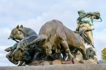 The Gefion fountain in Copenhagen, Denmark. It features a large-scale group of oxen pulling a plow...