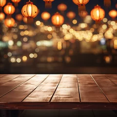  Dark wooden table top with blurred restaurant background chinese new year theme © Fay Melronna 