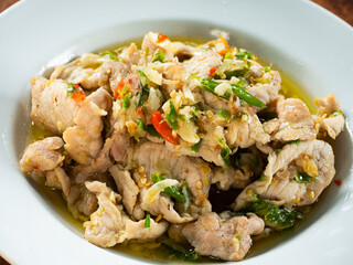 stir fried pork meat with garlic and chili pepper