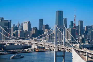 View of Tokyo Skyline and Tokyo Bay with Rainbow Bridge on  a clear blue sky day