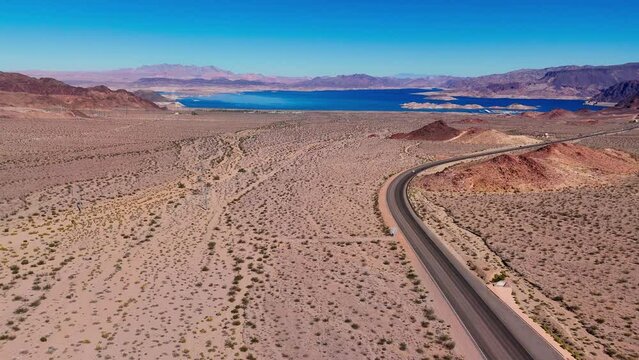 Lonesome road through the desert from above aerial view - aerial photography