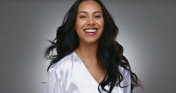 Hair care, woman and turn around with beauty and smile fresh salon treatment for glow and shine in studio on mock up. Cosmetic, person and smile for hairstyle, shampoo and wellness on gray background