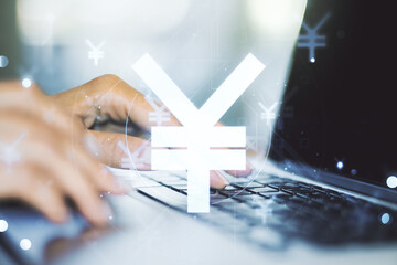 Creative Japanese Yen symbol illustration and hands typing on computer keyboard on background,...