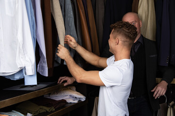 Beautiful gay couple goes shopping.