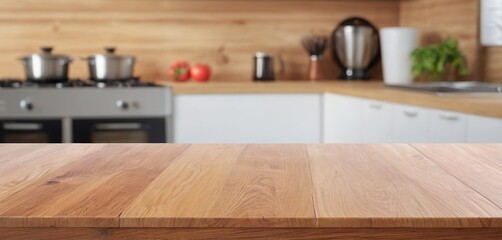 Wooden table on blurred kitchen bench background. Empty wooden table and blurred kitchen background for display or montage your products