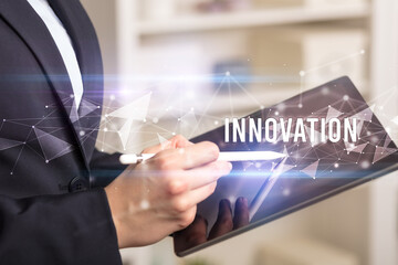 Close up hands using tablet