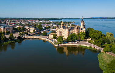 Aerial drone shot of the city of Schwerin and Schwerin Castle in northern Germany, surrounded by...