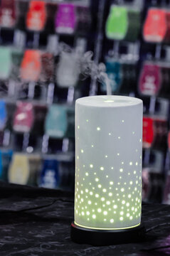 A lamp and vapouriser on display at a market stall