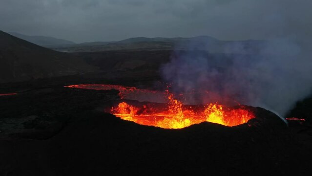 Aerial Panoramic footage of Litli-Hr&uacute;tur Volcano Eruption. Iceland 28.7.2023., Fagradalsfjall. Drone footage, Lava is Exploding and Spreading out of Crater.