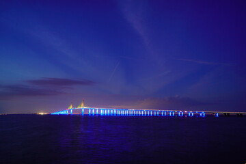 Night landscape of Skyway Fishing Pier State Park is a Florida State Park. The old broken collapsed bridge were left in place and converted into the longest fishing pier in the world.