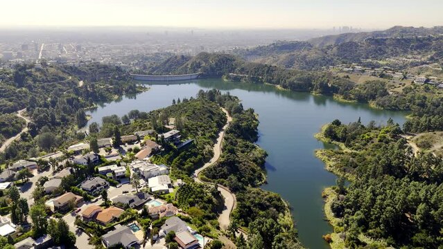 Lake Hollywood from above on a sunny day - Los Angeles Drone footage - aerial photography