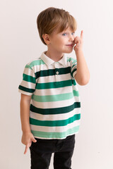 Portrait of a happy little boy on a white background © Светлана Назарова