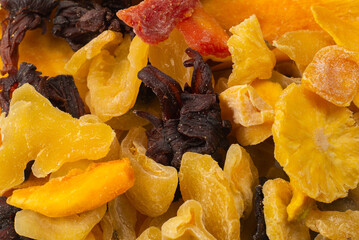 Mix of dried exotic fruit, mangos,slices of pineapples, passion fruit, papaya. - obrazy, fototapety, plakaty
