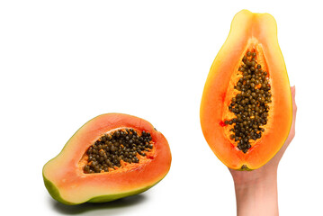 Papaya fruit isolated on a white background in woman hands. Half papaya.