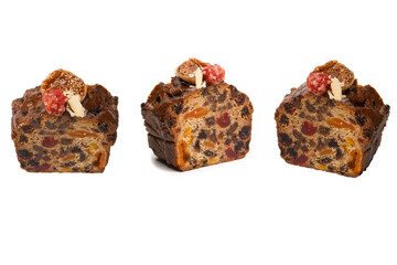 A cake with dried fruits, raisins almonds, dried strawberry.