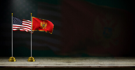 montenegro and USA flag wave on dark background. digital illustration for national activity or social media content. - obrazy, fototapety, plakaty