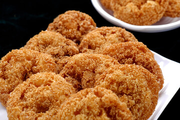 Anarsa which is an authentic sweet snack especially made in the festive season like Diwali in Maharashtra, it is also made in Marathi cultured adhik maas, selective focus.