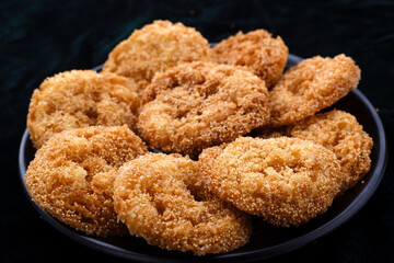 Anarsa which is an authentic sweet snack especially made in the festive season like Diwali in Maharashtra, it is also made in Marathi cultured adhik maas, selective focus.