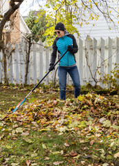 Raking leaves in the fall