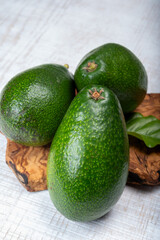 Green ripe avocado fruits from organic avocado plantation - healthy food