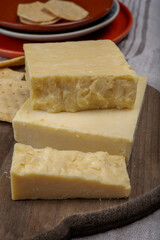 Fototapeta na wymiar British cheeses collection, Scottish coloured and English matured cheddar cheeses