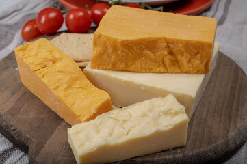 British cheeses collection, Scottish coloured and English matured cheddar cheeses