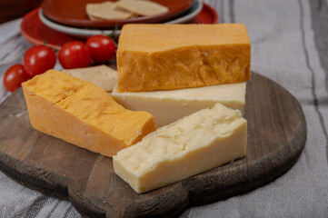 British cheeses collection, Scottish coloured and English matured cheddar cheeses
