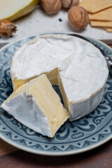 French soft Camembert cheese, original Camembert de Normandie, with white mold